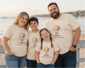 Family Wearing matching T-Shirts with Message to Presume competence