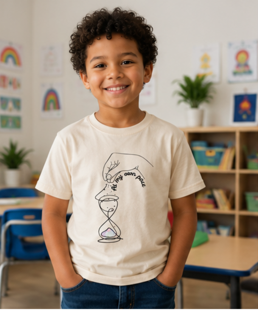 Child wearing a T-shirt to support different paces of development, in support of autism, autistic kids, ADHD, global developmental delay 